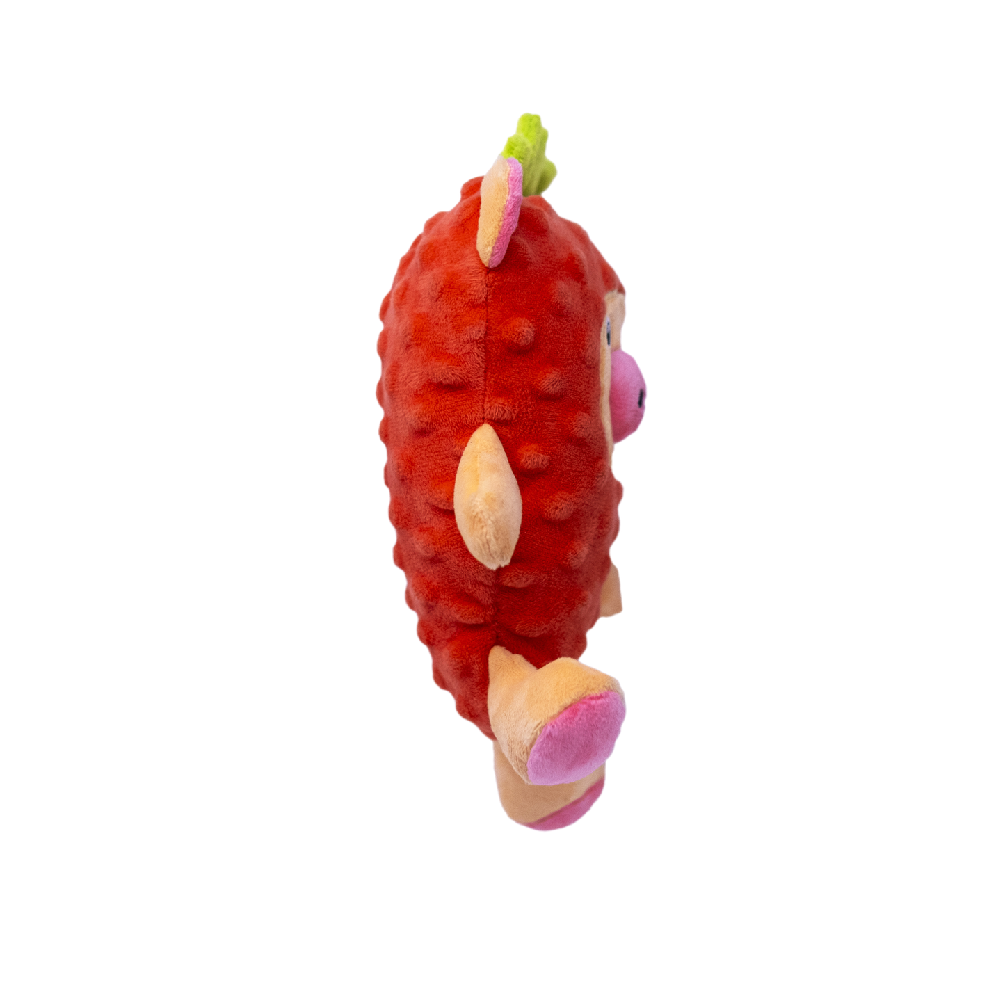 The side view of a plush red dog toy resembling a pig in a strawberry costume on a white background