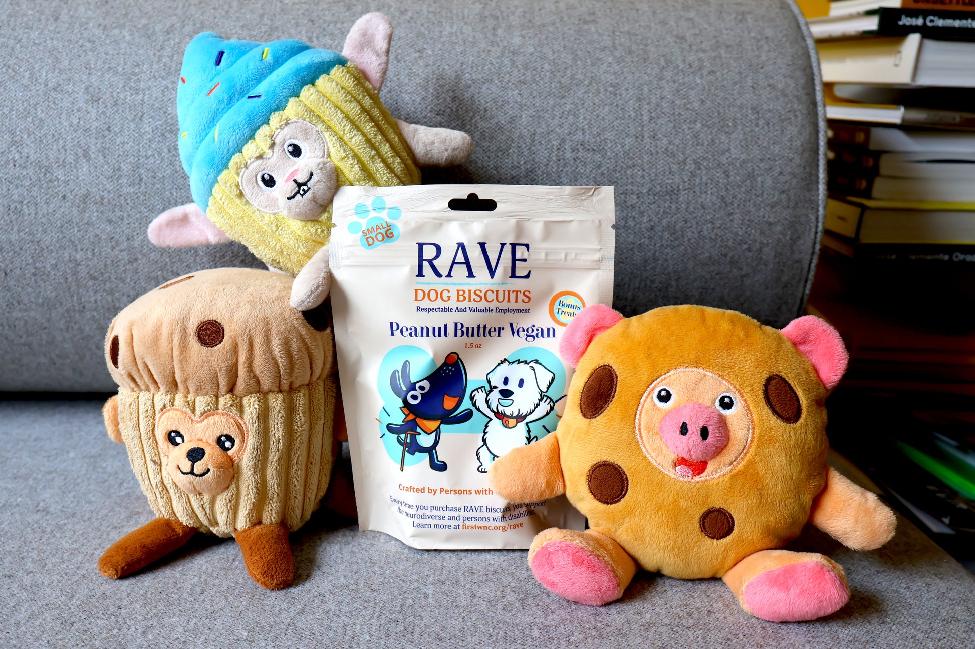 3 plush dog toys with a small bag of dog treats